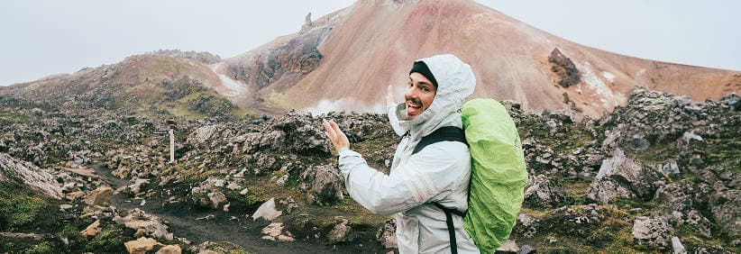 Campervan on an Iceland road in the low season, highlighting up to 50% off rental rates—smart choice for budget travelers planning adventures.