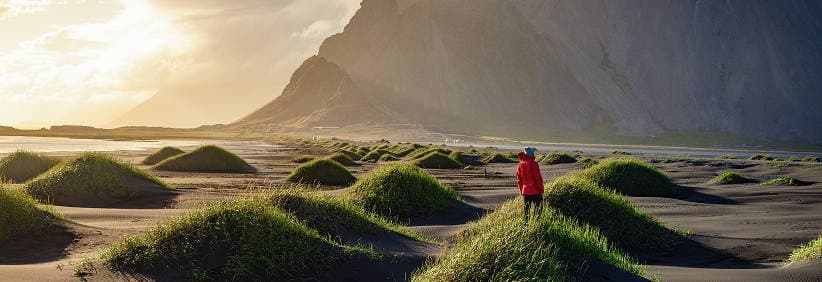 Campervan on Iceland's Ring Road at sunset, illustrating lower daily rates on longer rentals—see more of Iceland for less with Campervan Reykjavik.